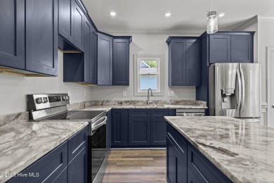 Coastal Luxury Meets Livability at 1552 Windsong Drive in Ocean on Brick Landing Plantation Yacht and Golf Club in North Carolina - for sale on GolfHomes.com, golf home, golf lot