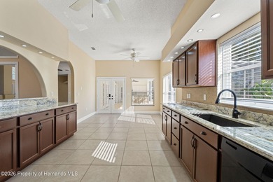 Welcome home to this beautiful Lindhorst-built pool home on Glen Lakes Country Club in Florida - for sale on GolfHomes.com, golf home, golf lot