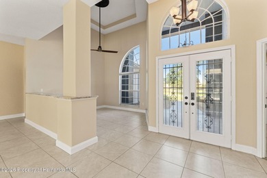 Welcome home to this beautiful Lindhorst-built pool home on Glen Lakes Country Club in Florida - for sale on GolfHomes.com, golf home, golf lot