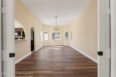 Welcome home to this beautiful Lindhorst-built pool home on Glen Lakes Country Club in Florida - for sale on GolfHomes.com, golf home, golf lot