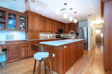 Wow. Don't miss this stylish, serene villa in Sarasota's 55+ on Village Green Golf Club of Sarasota in Florida - for sale on GolfHomes.com, golf home, golf lot