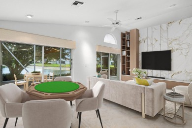 Lakefront single family home nestled amongst vibrant flowering on Westchester Golf and Country Club in Florida - for sale on GolfHomes.com, golf home, golf lot