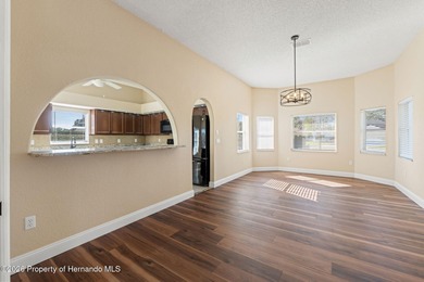 Welcome home to this beautiful Lindhorst-built pool home on Glen Lakes Country Club in Florida - for sale on GolfHomes.com, golf home, golf lot