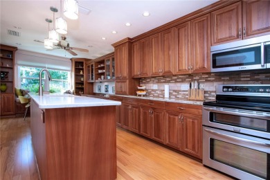 Wow. Don't miss this stylish, serene villa in Sarasota's 55+ on Village Green Golf Club of Sarasota in Florida - for sale on GolfHomes.com, golf home, golf lot