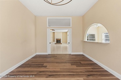 Welcome home to this beautiful Lindhorst-built pool home on Glen Lakes Country Club in Florida - for sale on GolfHomes.com, golf home, golf lot