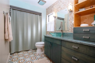 Wow. Don't miss this stylish, serene villa in Sarasota's 55+ on Village Green Golf Club of Sarasota in Florida - for sale on GolfHomes.com, golf home, golf lot
