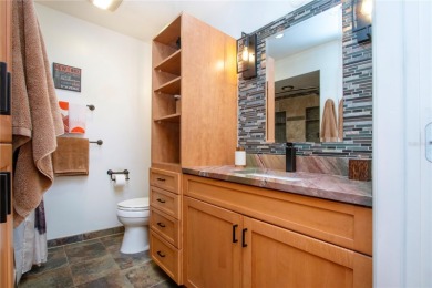 Wow. Don't miss this stylish, serene villa in Sarasota's 55+ on Village Green Golf Club of Sarasota in Florida - for sale on GolfHomes.com, golf home, golf lot