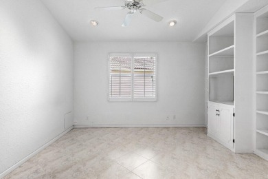 Lakefront single family home nestled amongst vibrant flowering on Westchester Golf and Country Club in Florida - for sale on GolfHomes.com, golf home, golf lot