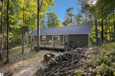 Enjoy 4 seasons at Schuss Mountain!  This updated raised ranch on Schuss Mountain Golf Club in Michigan - for sale on GolfHomes.com, golf home, golf lot