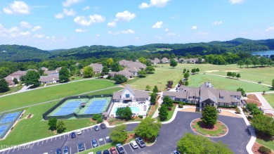 This level lot backs up to the championship tier golf course on Rarity Bay Country Club - Loudon in Tennessee - for sale on GolfHomes.com, golf home, golf lot