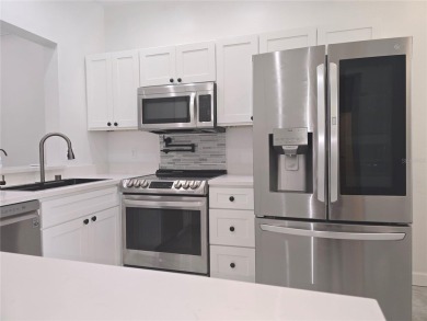 Fully Renovated  First-Floor Condo  Attached Garage on Ventura Country Club in Florida - for sale on GolfHomes.com, golf home, golf lot