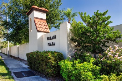Wow. Don't miss this stylish, serene villa in Sarasota's 55+ on Village Green Golf Club of Sarasota in Florida - for sale on GolfHomes.com, golf home, golf lot