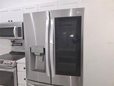 Fully Renovated  First-Floor Condo  Attached Garage on Ventura Country Club in Florida - for sale on GolfHomes.com, golf home, golf lot