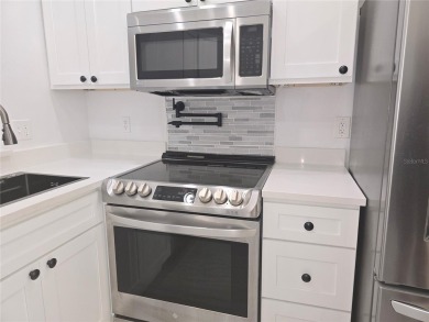 Fully Renovated  First-Floor Condo  Attached Garage on Ventura Country Club in Florida - for sale on GolfHomes.com, golf home, golf lot
