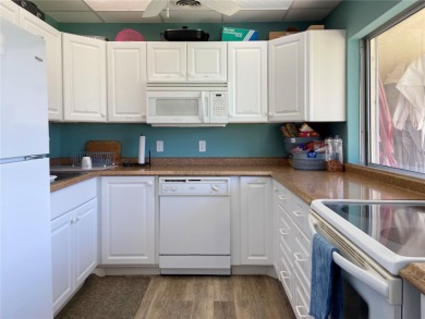 Wow. Don't miss this stylish, serene villa in Sarasota's 55+ on Village Green Golf Club of Sarasota in Florida - for sale on GolfHomes.com, golf home, golf lot