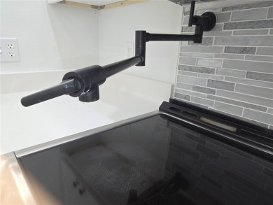 Fully Renovated  First-Floor Condo  Attached Garage on Ventura Country Club in Florida - for sale on GolfHomes.com, golf home, golf lot