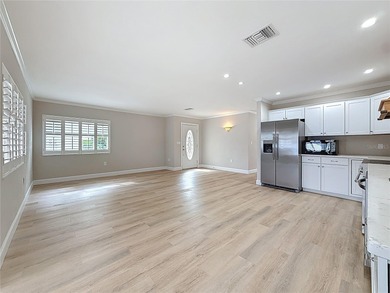 This Mariner Pass unit lives up to its name with a deep-water on Mangrove Bay Golf Course in Florida - for sale on GolfHomes.com, golf home, golf lot