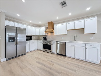 This Mariner Pass unit lives up to its name with a deep-water on Mangrove Bay Golf Course in Florida - for sale on GolfHomes.com, golf home, golf lot