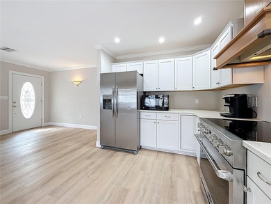 This Mariner Pass unit lives up to its name with a deep-water on Mangrove Bay Golf Course in Florida - for sale on GolfHomes.com, golf home, golf lot