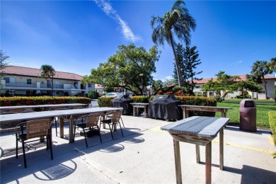 Wow. Don't miss this stylish, serene villa in Sarasota's 55+ on Village Green Golf Club of Sarasota in Florida - for sale on GolfHomes.com, golf home, golf lot