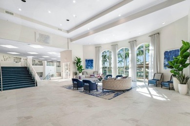 Lakefront single family home nestled amongst vibrant flowering on Westchester Golf and Country Club in Florida - for sale on GolfHomes.com, golf home, golf lot