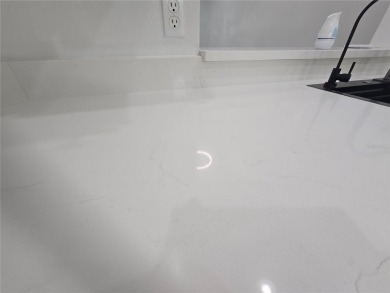 Fully Renovated  First-Floor Condo  Attached Garage on Ventura Country Club in Florida - for sale on GolfHomes.com, golf home, golf lot