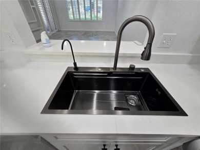 Fully Renovated  First-Floor Condo  Attached Garage on Ventura Country Club in Florida - for sale on GolfHomes.com, golf home, golf lot