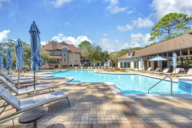 After entering the gate into Wild Heron, you realize you are in on Sharks Tooth Golf Club in Florida - for sale on GolfHomes.com, golf home, golf lot