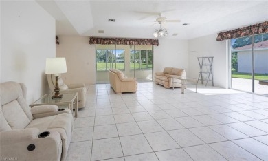 In addition to the 1,630 s/f under air, this attractive 2BR/2BA on Riviera Golf Club in Florida - for sale on GolfHomes.com, golf home, golf lot