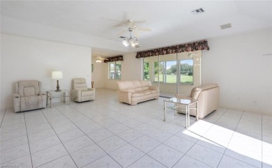 In addition to the 1,630 s/f under air, this attractive 2BR/2BA on Riviera Golf Club in Florida - for sale on GolfHomes.com, golf home, golf lot