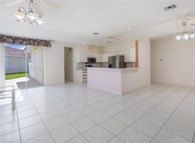 In addition to the 1,630 s/f under air, this attractive 2BR/2BA on Riviera Golf Club in Florida - for sale on GolfHomes.com, golf home, golf lot
