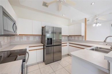 In addition to the 1,630 s/f under air, this attractive 2BR/2BA on Riviera Golf Club in Florida - for sale on GolfHomes.com, golf home, golf lot