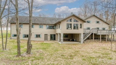 Custom-built home on the 16th green of top-rated Timberstone on TimberStone At Pine Mountain in Michigan - for sale on GolfHomes.com, golf home, golf lot
