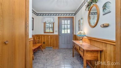Custom-built home on the 16th green of top-rated Timberstone on TimberStone At Pine Mountain in Michigan - for sale on GolfHomes.com, golf home, golf lot