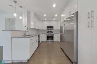 BRAND NEW EVERYTHING! Beautiful completely remodeled 3 bedroom on Davie Golf Club in Florida - for sale on GolfHomes.com, golf home, golf lot