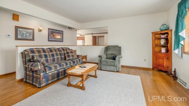 Custom-built home on the 16th green of top-rated Timberstone on TimberStone At Pine Mountain in Michigan - for sale on GolfHomes.com, golf home, golf lot