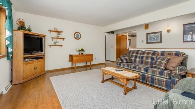 Custom-built home on the 16th green of top-rated Timberstone on TimberStone At Pine Mountain in Michigan - for sale on GolfHomes.com, golf home, golf lot