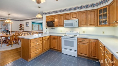 Custom-built home on the 16th green of top-rated Timberstone on TimberStone At Pine Mountain in Michigan - for sale on GolfHomes.com, golf home, golf lot