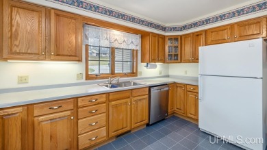Custom-built home on the 16th green of top-rated Timberstone on TimberStone At Pine Mountain in Michigan - for sale on GolfHomes.com, golf home, golf lot