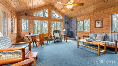 Custom-built home on the 16th green of top-rated Timberstone on TimberStone At Pine Mountain in Michigan - for sale on GolfHomes.com, golf home, golf lot