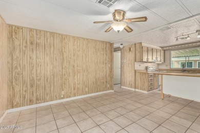 This spacious home features a SPLIT floorplan w/ 3 BEDROOMS & 2 on Sun Lakes Country Club in Arizona - for sale on GolfHomes.com, golf home, golf lot