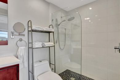 This two-bedroom, two-bathroom condominium offers approximately on Palm-Aire Country Club and Resort - Palms in Florida - for sale on GolfHomes.com, golf home, golf lot