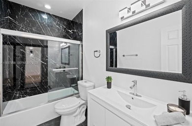 Welcome to this stunning, fully furnished modern residence on Eco Golf Club in Florida - for sale on GolfHomes.com, golf home, golf lot