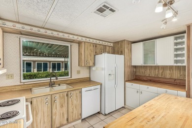 This spacious home features a SPLIT floorplan w/ 3 BEDROOMS & 2 on Sun Lakes Country Club in Arizona - for sale on GolfHomes.com, golf home, golf lot