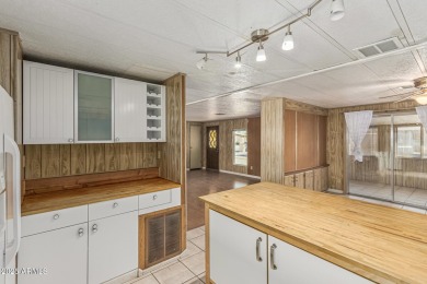 This spacious home features a SPLIT floorplan w/ 3 BEDROOMS & 2 on Sun Lakes Country Club in Arizona - for sale on GolfHomes.com, golf home, golf lot