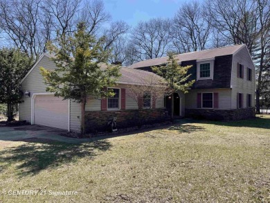 Welcome to 7229 S Lake Bluff! This newly revamped home is on Terrace Bluff Golf Course in Michigan - for sale on GolfHomes.com, golf home, golf lot