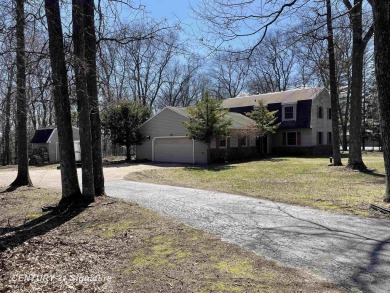 Welcome to 7229 S Lake Bluff! This newly revamped home is on Terrace Bluff Golf Course in Michigan - for sale on GolfHomes.com, golf home, golf lot