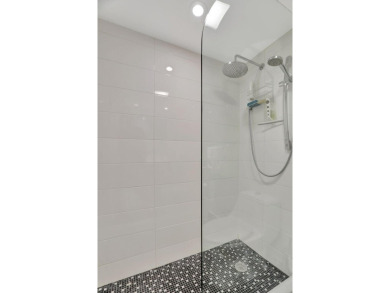 This two-bedroom, two-bathroom condominium offers approximately on Palm-Aire Country Club and Resort - Palms in Florida - for sale on GolfHomes.com, golf home, golf lot