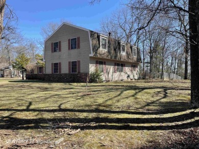 Welcome to 7229 S Lake Bluff! This newly revamped home is on Terrace Bluff Golf Course in Michigan - for sale on GolfHomes.com, golf home, golf lot