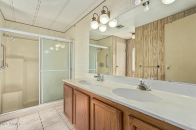 This spacious home features a SPLIT floorplan w/ 3 BEDROOMS & 2 on Sun Lakes Country Club in Arizona - for sale on GolfHomes.com, golf home, golf lot